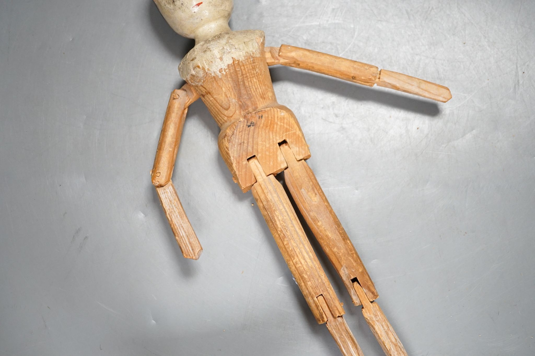 A 19th German carved wood peg doll 32cm